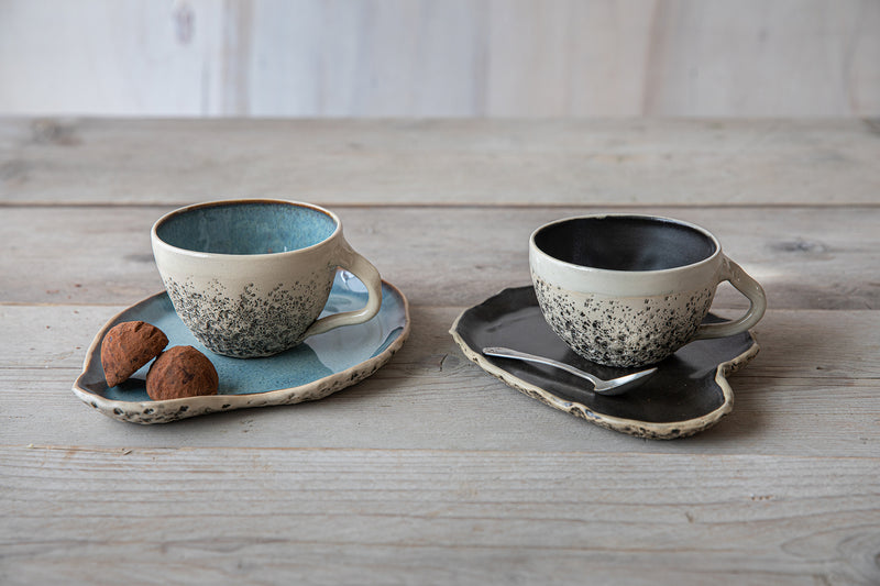 Tea -and cappuccino cups with saucer