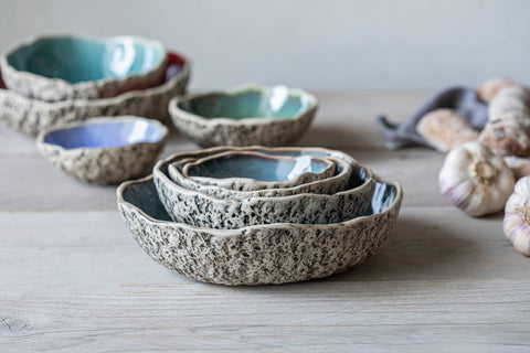 Handmade pottery bowls with organic effect on exterior